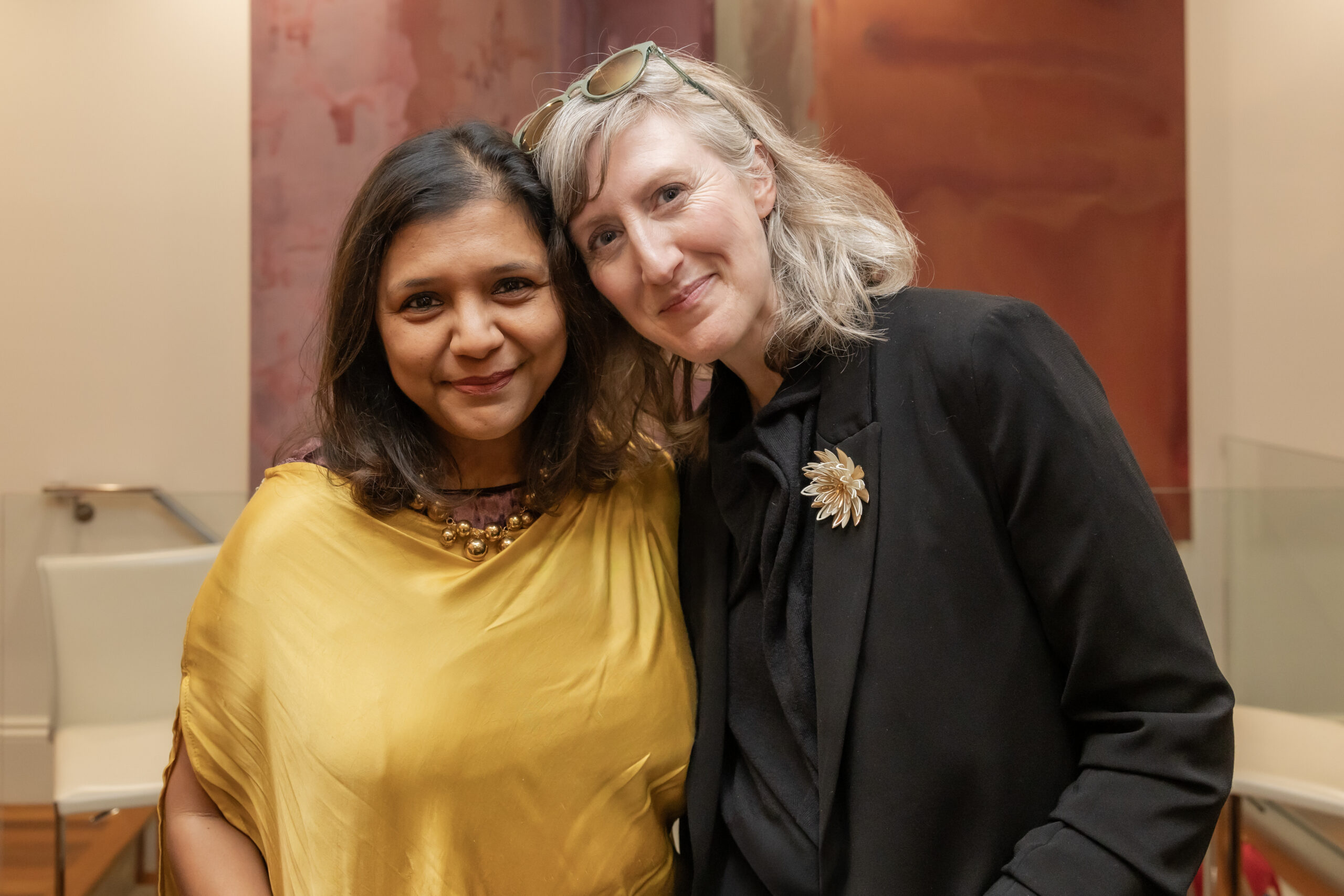 Women making new friends at a Parlay House event